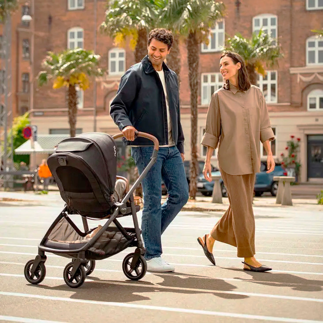Coche de bebé compacto Nuna Swiv™ BMW Umber