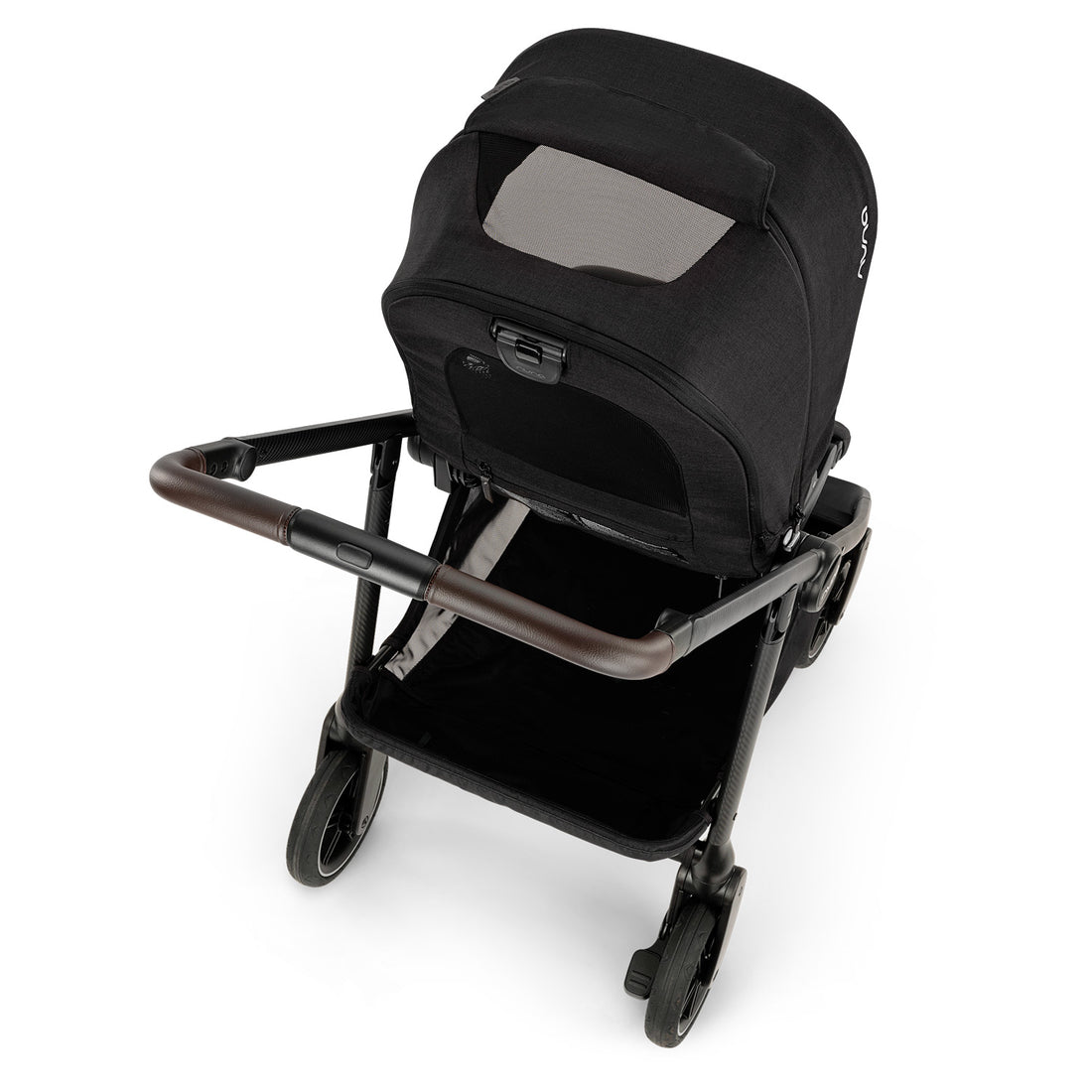 Coche de bebé compacto Nuna Swiv Caviar